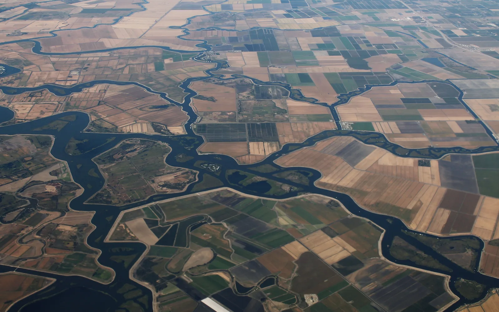 Aerial view of the Sacramento-San Joaquin Delta showing river channels and agricultural landscape